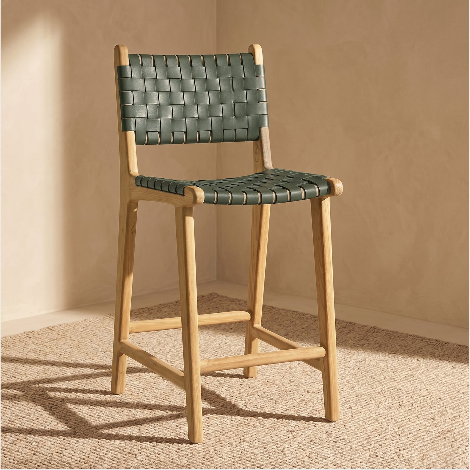 Banda Teak & Woven Leather Counter Height Stool | Hunter Green lifestyle_image